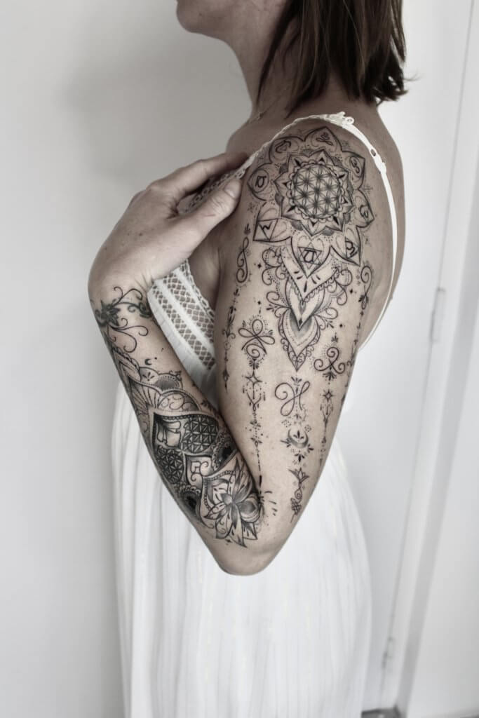 bras compet tattoo ornemental femme